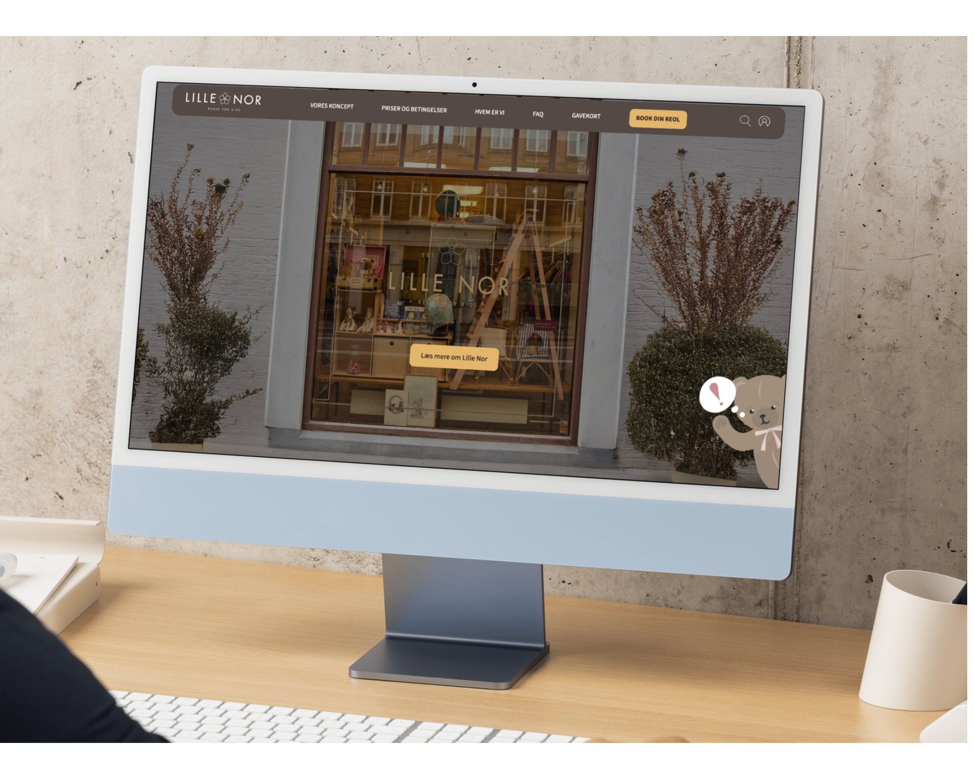 Mockup af Lille Nor website på en skærm